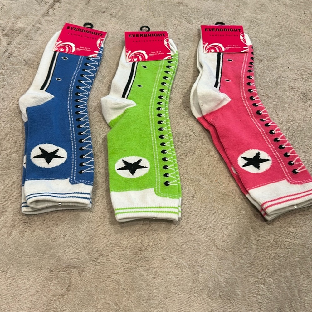 NWT. Converse Sneaker Socks Set of three. Fits shoe size 4-10 (sock size 9-11).